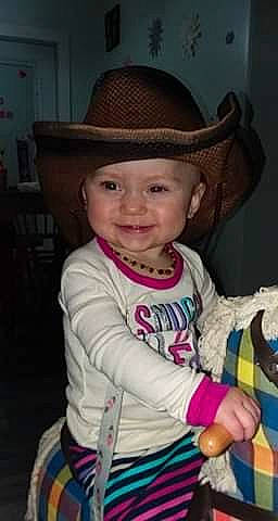 Brixley joined the competition — help win amazing prizes! baby, baby_products, baby_toddler_clothing, blond, cap, cheek, child, eye, fashion_accessory, fun, happy, hat, headwear, iris, joy, magenta, person, sitting, skin, sleeve