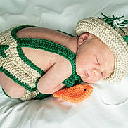 Josh joined the competition — help win amazing prizes! baby, beige, blanket, child, closeup, cozy, crochet, cute, green, hat, infant, newborn, orange, peaceful, portrait, resting, sleeping, soft, toy, yarn