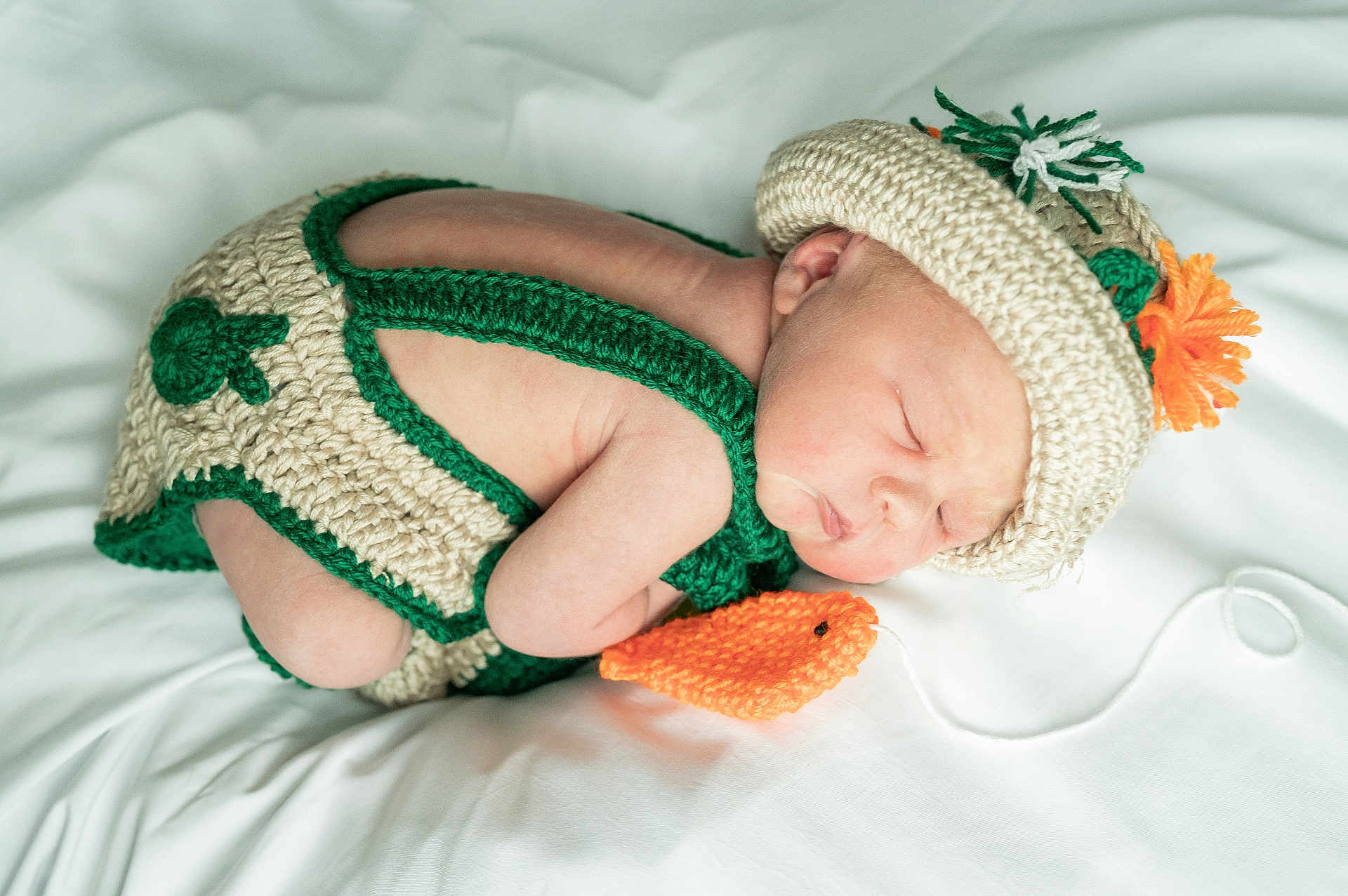 Josh joined the competition — help win amazing prizes! baby, beige, blanket, child, closeup, cozy, crochet, cute, green, hat, infant, newborn, orange, peaceful, portrait, resting, sleeping, soft, toy, yarn