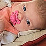 Alba participe au concours pour gagner de l'argent avec cette photo : baby, pacifier, close_up, infant, face, eyes, blanket, bibs, soft_toys, resting, indoor, cute, child, newborn, pink, white_clothing, portrait, young, calm, cozy