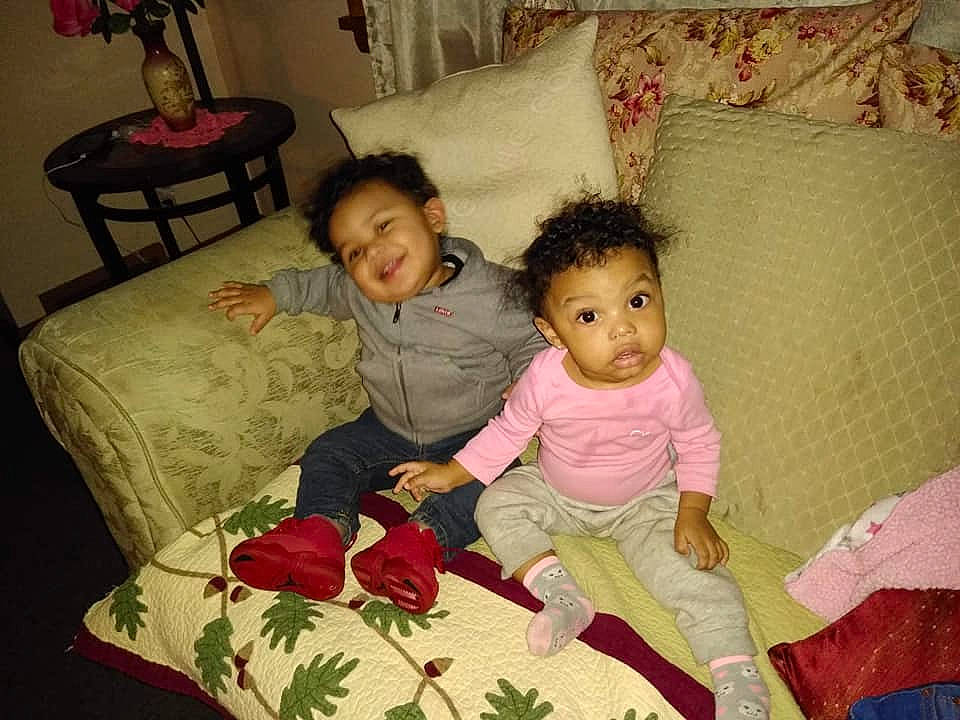 Montrell joined the competition — help win amazing prizes! baby, bed, bedtime, child, cushion, daughter, family, furniture, joy, person, room, sibling, sitting, smile, textile, toddler