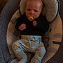Tyliano a rejoint le concours — aidez-le/la à gagner de superbes lots ! baby, infant, pacifier, baby_seat, cushion, clothing, pants, socks, black_shirt, face, person, indoor, cute, child, newborn, expression, seated, comfort, plush, resting