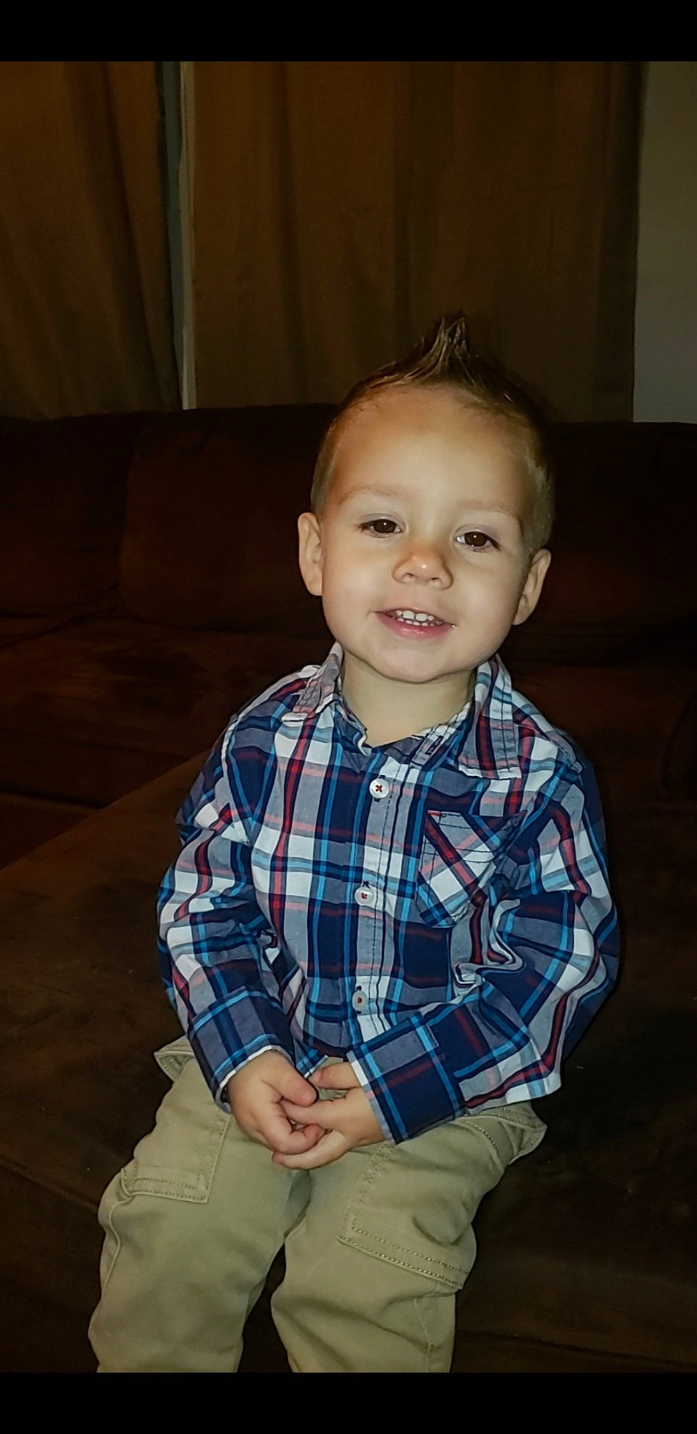 Bentley is registered to the contest to win money with this photo: baby_toddler_clothing, cheek, child, cool, ear, eye, forehead, hardwood, iris, joy, mouth, nose, organ, pattern, person, plaid, sitting, skin, sleeve, standing