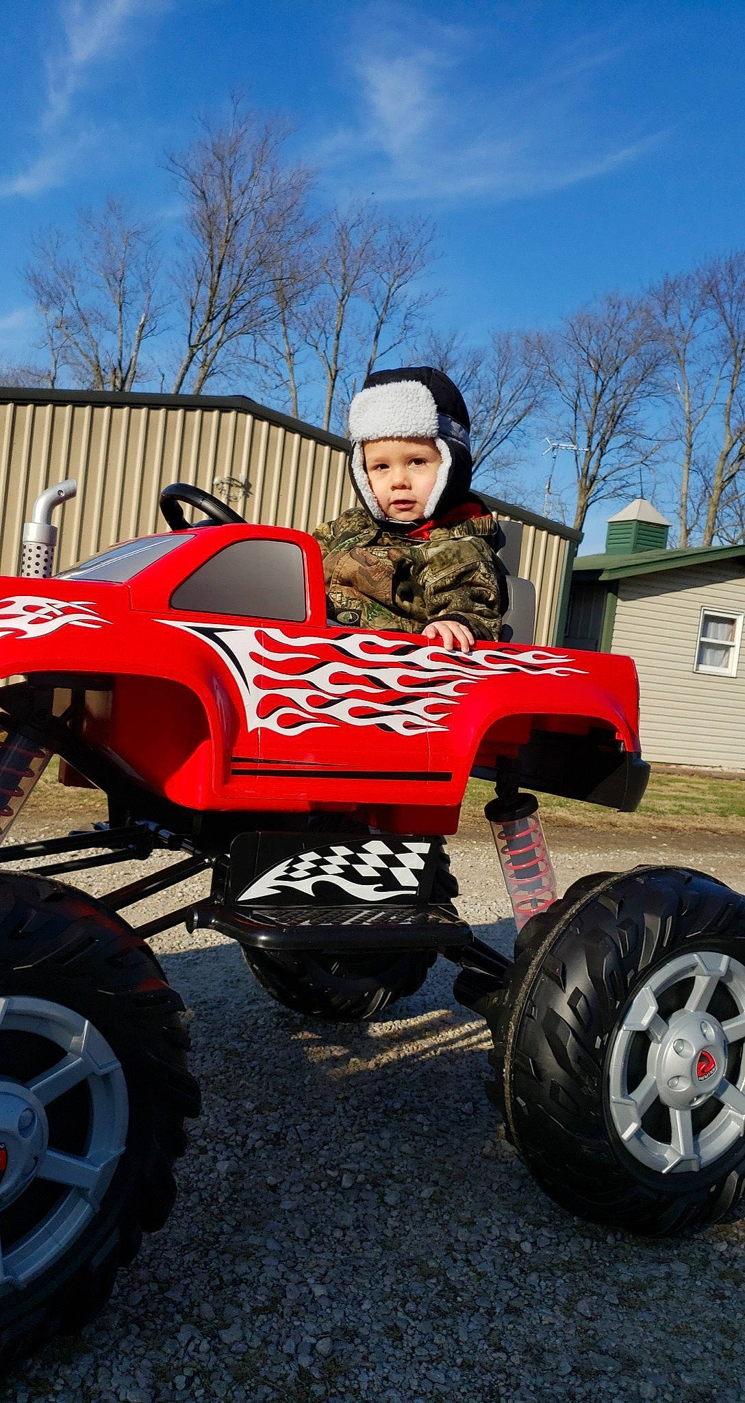 Bentley is registered to the contest to win money with this photo: all_terrain_vehicle, alloy_wheel, auto_part, automotive_tire, automotive_wheel_system, beanie, boot, headwear, hubcap, knit_cap, locking_hubs, person, rim, rolling, spoke, synthetic_rubber, tire, tire_care, tread, wheel