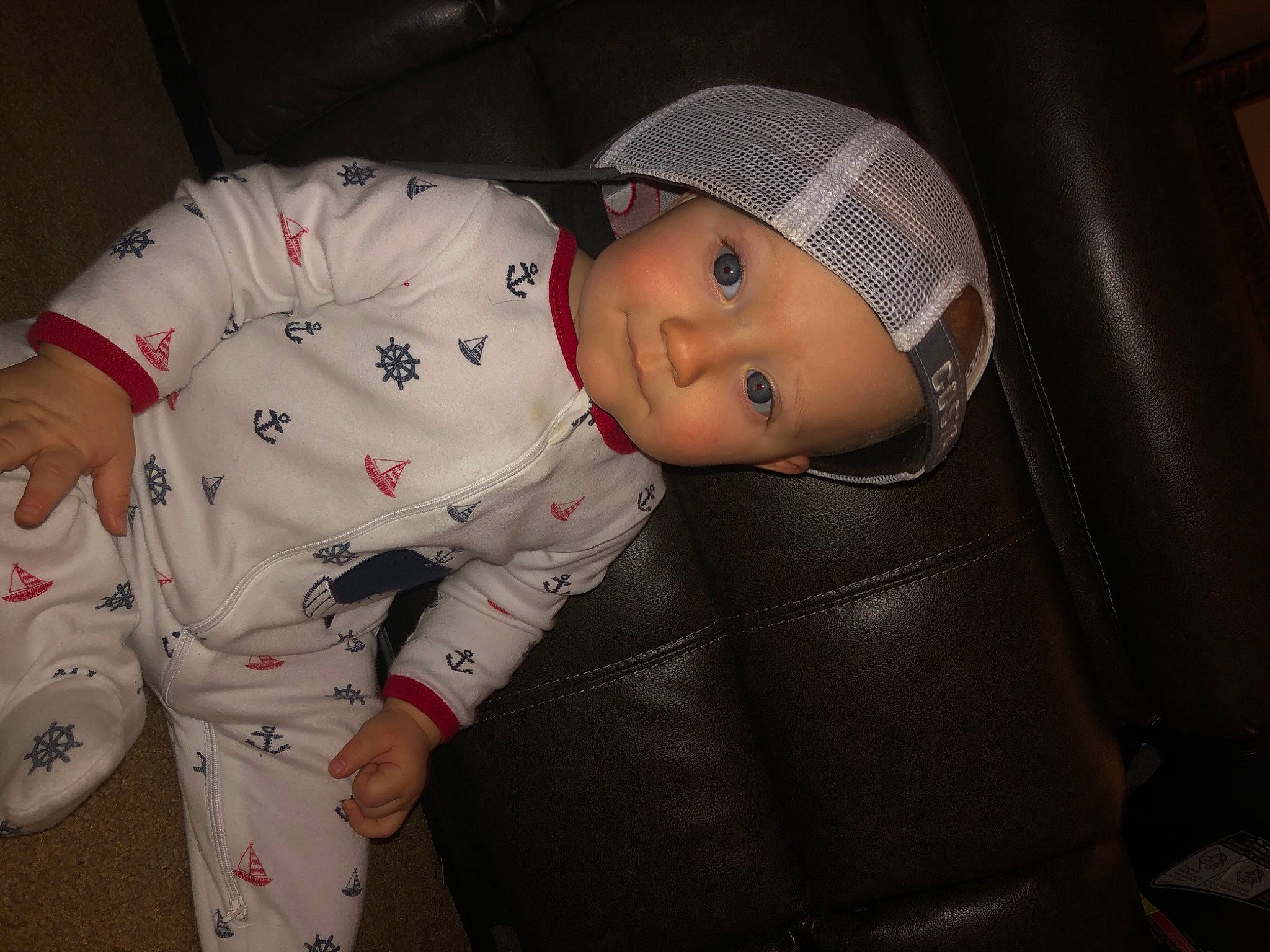Austin joined the competition — help win amazing prizes! baby, baby_products, baby_toddler_clothing, cap, car_seat, carmine, cheek, child, comfort, eye, face, fashion_accessory, flash_photography, fun, hat, headwear, person, room, sitting, sleeve