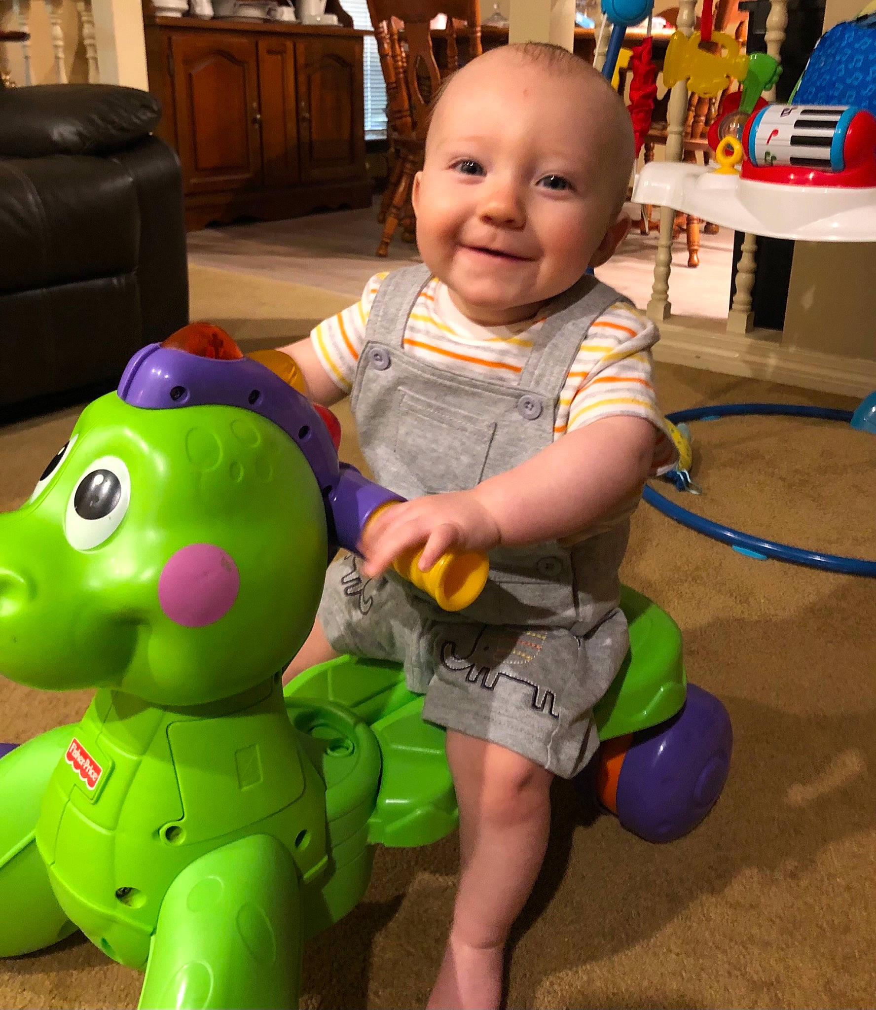 Austin joined the competition — help win amazing prizes! baby, baby_toddler_clothing, blue, child, eye, facial_expression, flooring, fun, green, happy, head, joint, joy, leg, organ, person, product, skin, smile, snapshot