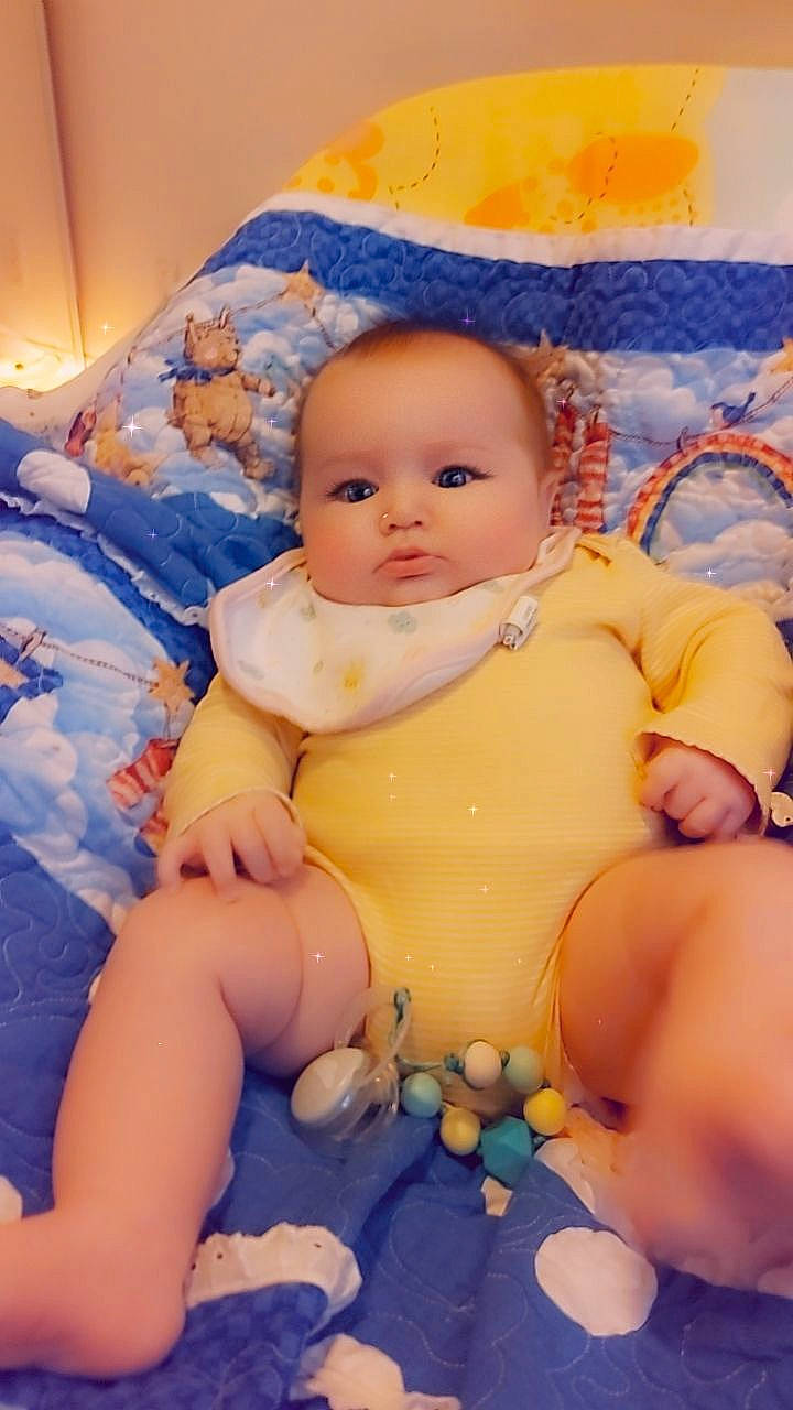 Riley is registered to the contest to win money with this photo: abdomen, baby, baby_toddler_clothing, cheek, chest, comfort, finger, happy, head, human_body, iris, mouth, orange, person, skin, stomach, thigh, thumb, toddler, trunk