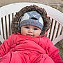 Olivia a rejoint le concours — aidez-le/la à gagner de superbes lots ! baby, infant, child, knit_hat, fur_hood, pink_snowsuit, bundled_up, blue_eyes, rosy_cheeks, plastic_chair, chair, outdoor, portrait, cold_weather, cozy, cute, face, smile, winter_clothing, drool