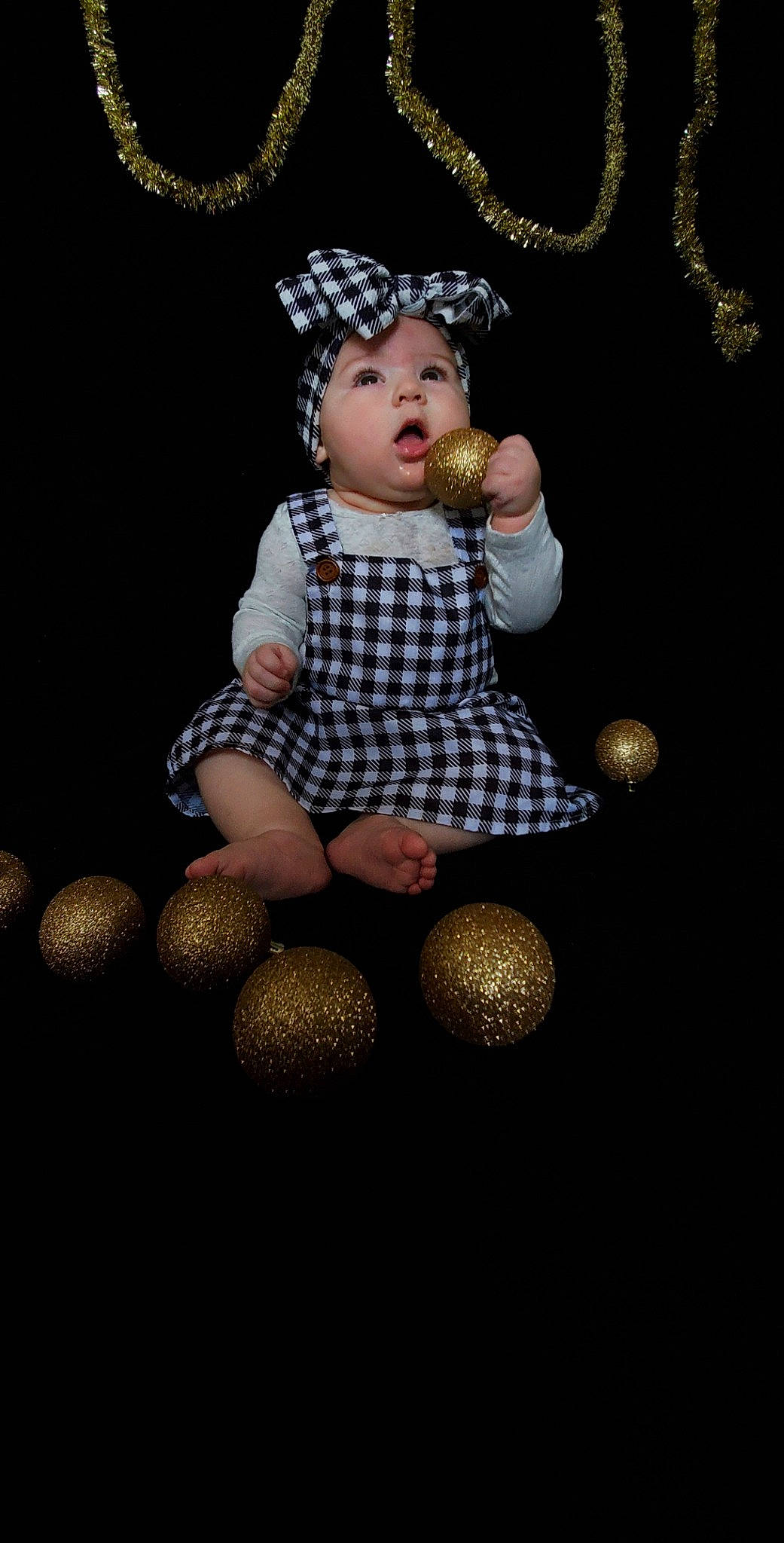 Kira joined the competition — help win amazing prizes! audio_equipment, ball, cap, child, costume_hat, darkness, doll, entertainment, event, fashion_accessory, figurine, fur, human_leg, jewellery, pattern, person, shoe, sitting, sports_equipment, stuffed_toy