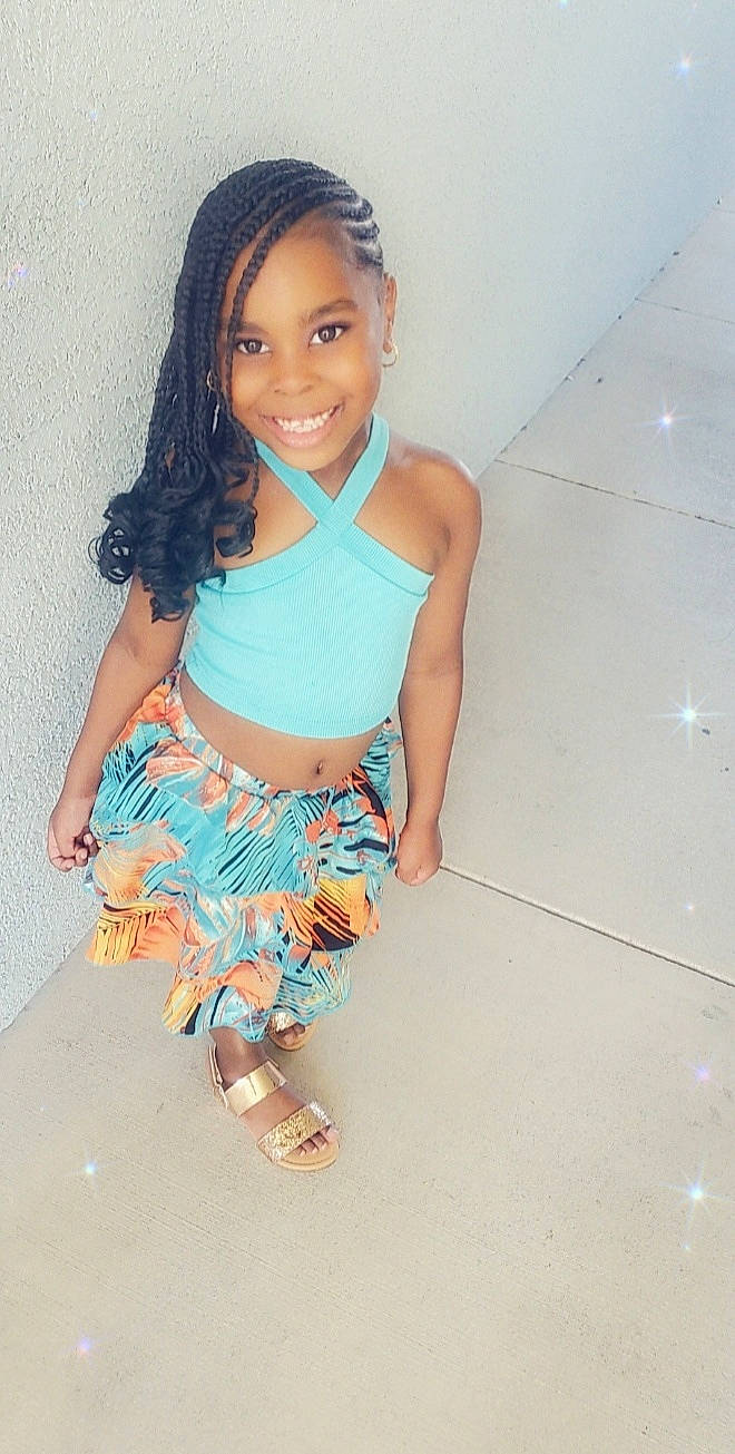 Kamiyah joined the competition — help win amazing prizes! accessories, child, clothing, dress, face, female, footwear, girl, hair, head, jewelry, necklace, pants, person, photography, portrait, sandal, shoe, shorts, skirt
