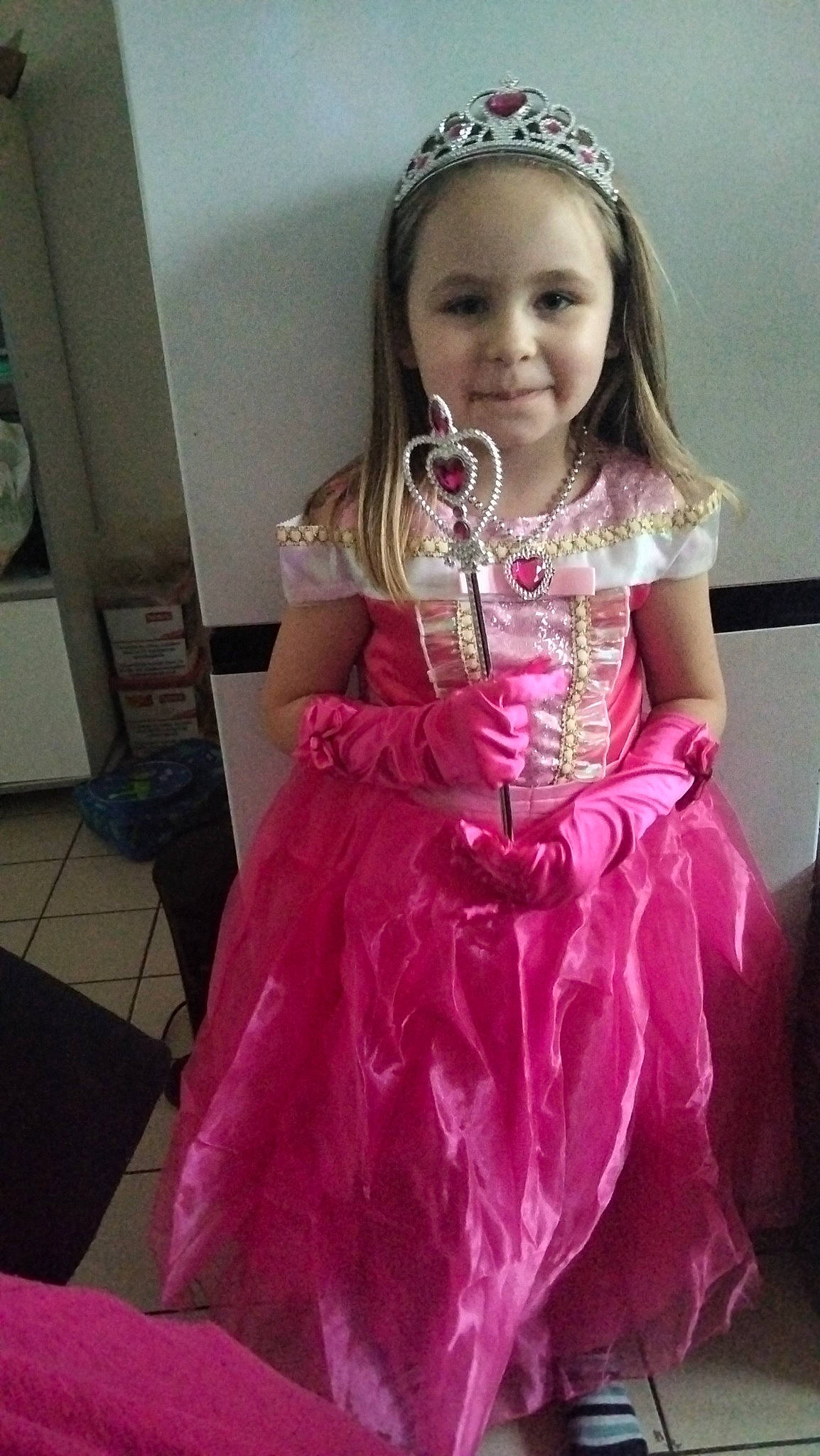 Elya participe au concours pour gagner de l'argent avec cette photo : baby_toddler_clothing, bridal_accessory, day_dress, dress, embellishment, face, fashion_design, hair, hairstyle, happy, head, headpiece, iris, joy, long_hair, magenta, person, pink, purple, skin