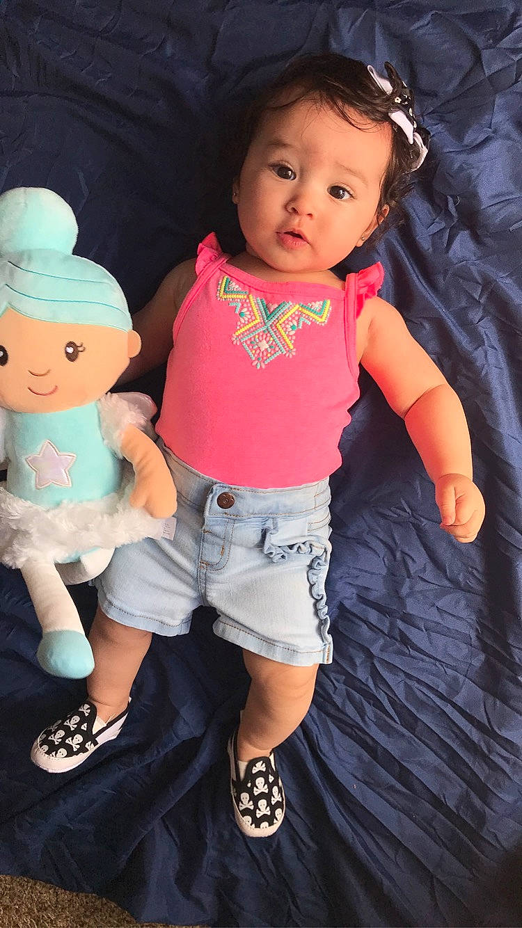 Isabella is registered to the contest to win money with this photo: baby, baby_toddler_clothing, child, cool, facial_expression, fashion, gesture, hairstyle, hand, person, pink, product, shorts, skin, sleeve, standing, style, surprise, t_shirt, toddler