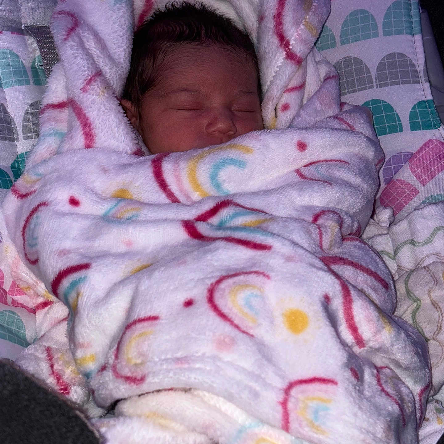 Isabella Rosalia is registered to the contest to win money with this photo: baby, baby_seat, bed, blanket, child, colorful, cozy, cute, face, feet, indoors, infant, newborn, pattern, peaceful, portrait, resting, sleeping, soft, swaddled