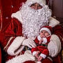 Evanna participe au concours pour gagner de l'argent avec cette photo : baby, celebration, chair, christmas, cute, festive, fur_trim, glasses, gloves, hat, holding, holiday, indoor, portrait, pose, red_clothing, santa_claus, smiling, velvet, white_beard
