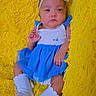 baby, infant, child, portrait, lying_down, blue_dress, tutu, white_socks, headband, flower, yellow_blanket, fluffy_blanket, smiling, indoor, close_up, baby_fashion, cute, ballet_style, colorful, photography