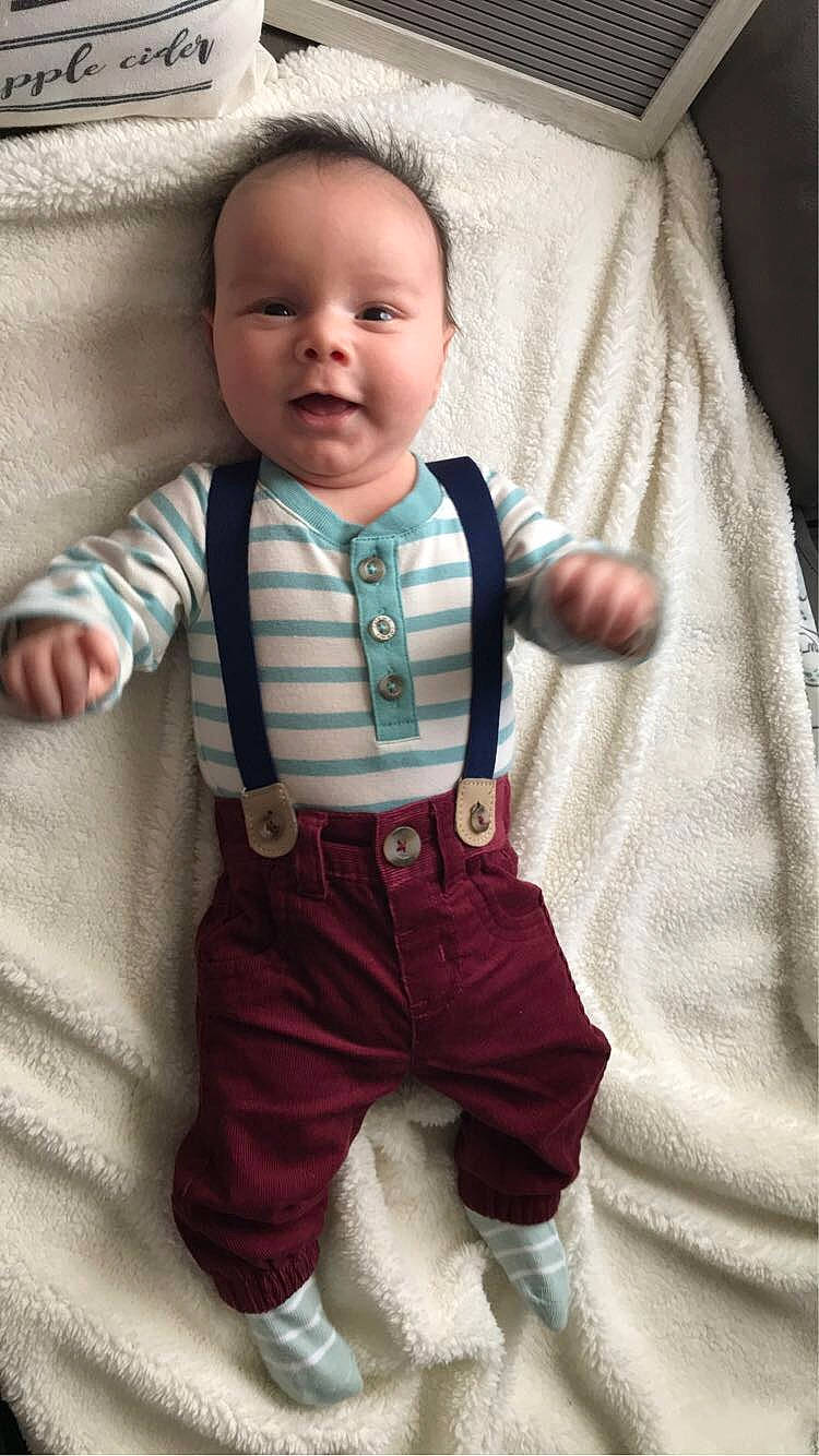 William joined the competition — help win amazing prizes! arm, baby, baby_toddler_clothing, cheek, child, collar, dress_shirt, eye, face, hand, head, outerwear, pattern, person, skin, sleeve, sock, standing, t_shirt, textile