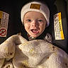 Richie joined the competition — help win amazing prizes!  안전, baby, baby_clothing, blanket, car_seat, child, close_up, eyes, face, fluffy_blanket, happy, hat, indoors, infant, knit_hat, portrait, safety_labels, seated, smiling, vehicle