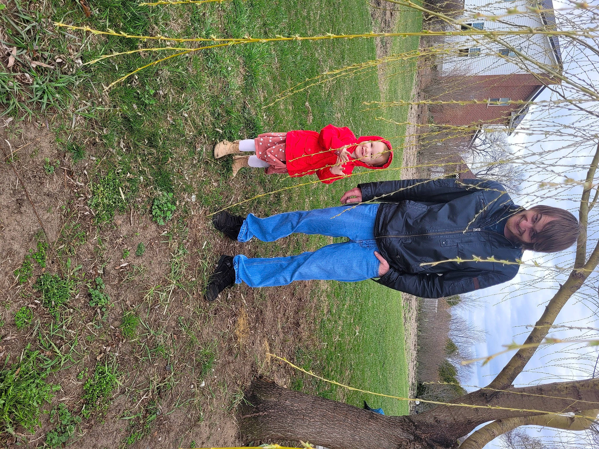 Isabell is registered to the contest to win money with this photo: adventure, freezing, fun, grass, headwear, joy, leisure, outdoor_shoe, people_in_nature, person, plant, recreation, slope, smile, snow, soil, toddler, tree, twig, winter