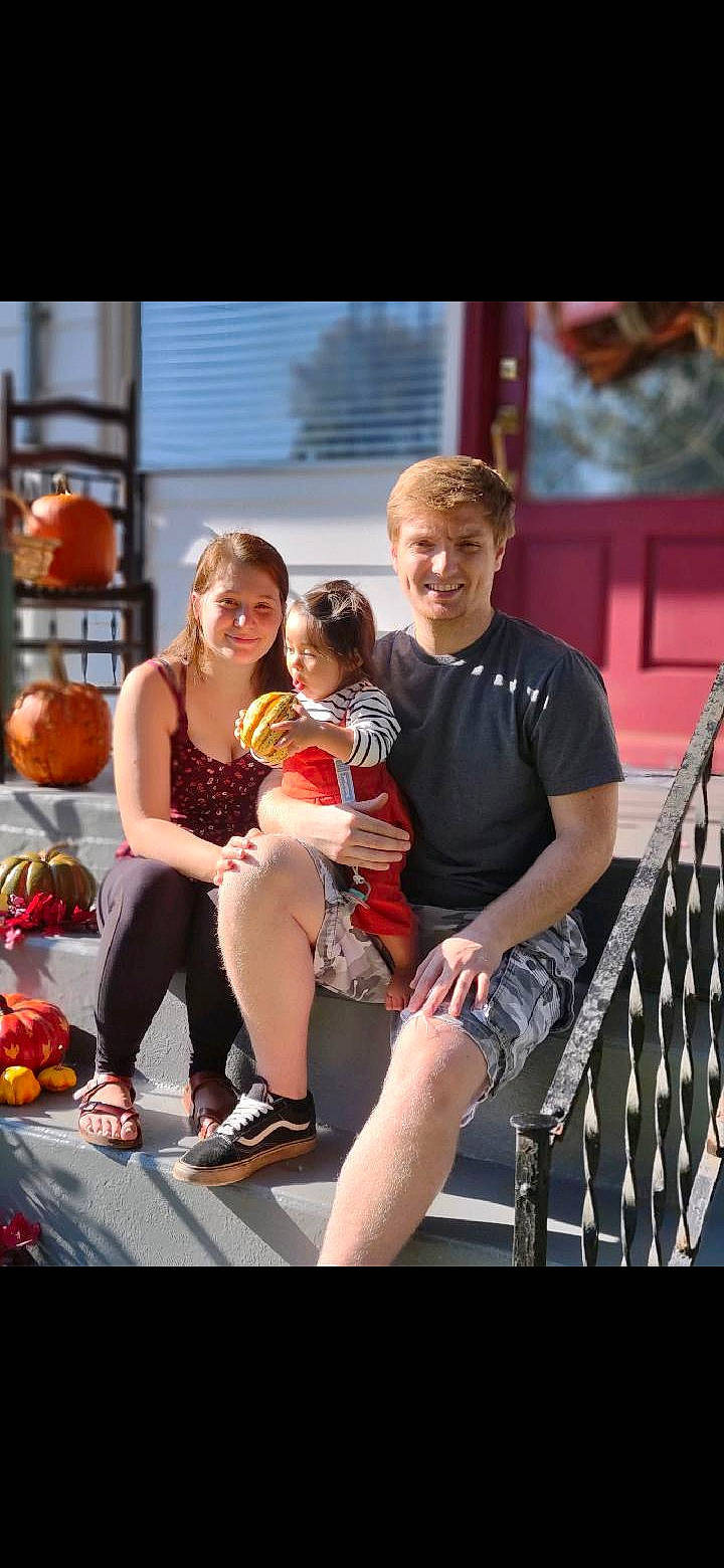 Danielle is registered to the contest to win money with this photo: child, event, eyewear, fun, happy, human_leg, interaction, joy, leg, leisure, natural_foods, person, recreation, sandal, shoe, shorts, sitting, smile, summer, t_shirt