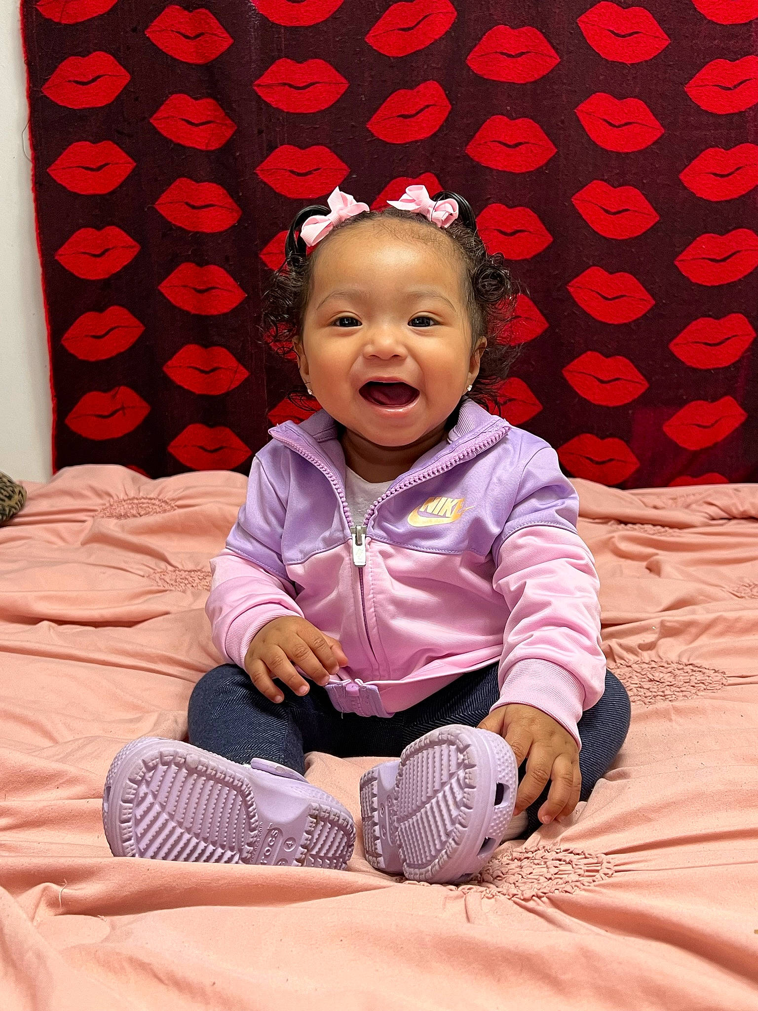 Talani Alaya is registered to the contest to win money with this photo: baby, baby_toddler_clothing, cheek, child, comfort, event, flash_photography, fun, happy, leisure, light, magenta, pattern, person, pink, purple, red, sitting, sleeve, smile