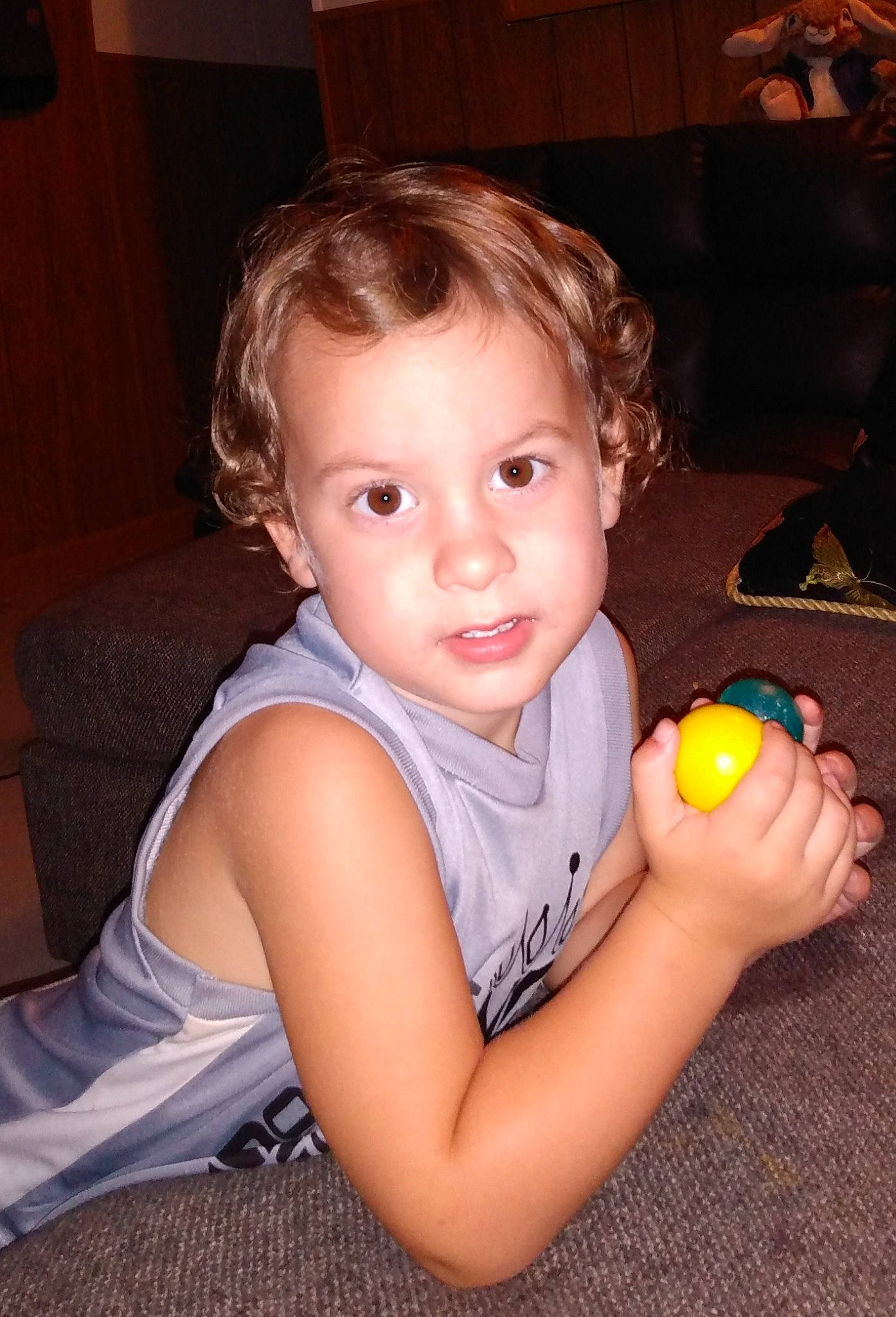 Lyle is registered to the contest to win money with this photo: baby, ball, cheek, child, eye, iris, person, play, room, skin, smile, toddler