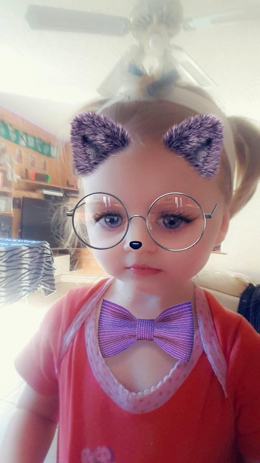 Emma a rejoint le concours — aidez-le/la à gagner de superbes lots ! child, doll, eyebrow, eyelash, eyewear, face, forehead, glasses, head, lip, nose, person, pink, purple, skin, toy, vision_care
