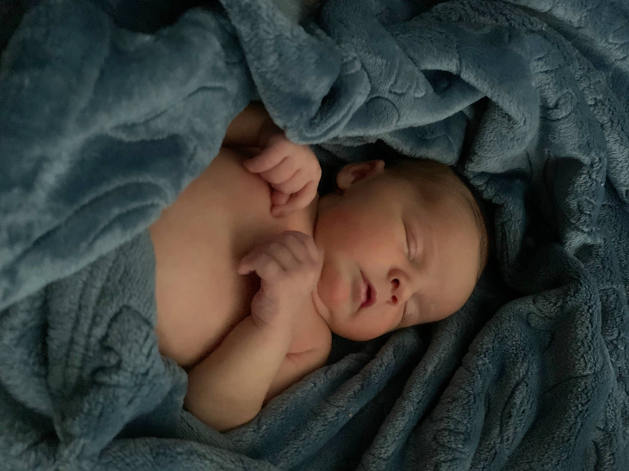 Lawrence is registered to the contest to win money with this photo: baby, baby_sleeping, bedding, bedtime, cheek, child, comfort, fur, gesture, grass, grey, linens, nap, person, portrait_photography, room, skin, sleep, sleeve, toddler