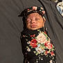 Kaylani joined the competition — help win amazing prizes! baby, newborn, swaddled, floral_pattern, headwrap, blanket, bed, sleeping, closed_eyes, peaceful, infant, portrait, cozy, cute, small, indoor, fabric, pattern, skin, nursery_bedding