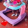 Jycee is registered to the contest to win money with this photo: baby, walker, child, indoor, playroom, red_clothing, pink_bows, toy, floor, crib, curious, infant, social_media, emoji, furniture, shoes, person, cute, colorful, young_child