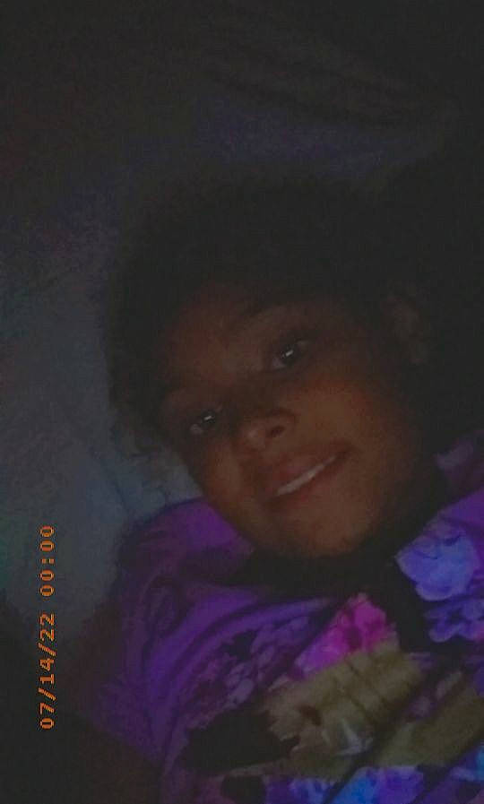 Zoe is registered to the contest to win money with this photo: black_hair, cheek, child, darkness, eyebrow, flash_photography, forehead, fun, happy, iris, jaw, lip, magenta, midnight, mouth, nose, person, portrait, purple, smile