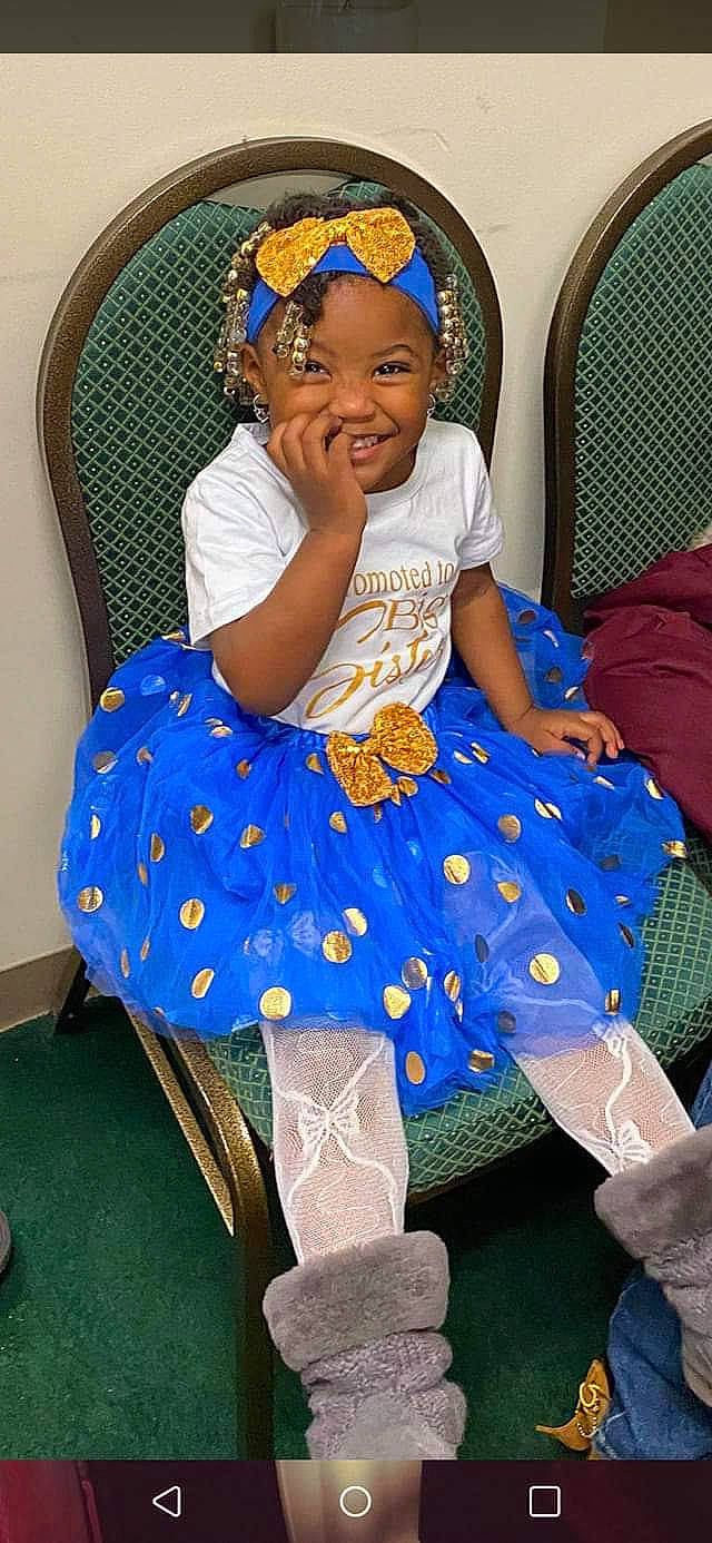 Savannah joined the competition — help win amazing prizes! baby_toddler_clothing, black, blue, chair, child, comfort, electric_blue, event, happy, hat, headwear, human_leg, joy, magenta, pattern, person, purple, textile, thigh, toddler