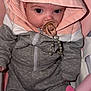 baby, pacifier, hoodie, pink, grey_clothing, infant, child, seat, toy, soft_toy, cute, indoor, portrait, face, small_hand, zipped_jacket, baby_accessory, expression, closeup, sitting