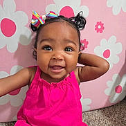 Lulu joined the competition — help win amazing prizes! baby, background, carpet, child, cute, expression, face, flower_pattern, girl, hair_bow, happy, indoor, person, pigtails, pink_dress, playful, portrait, skin, smiling, toddler