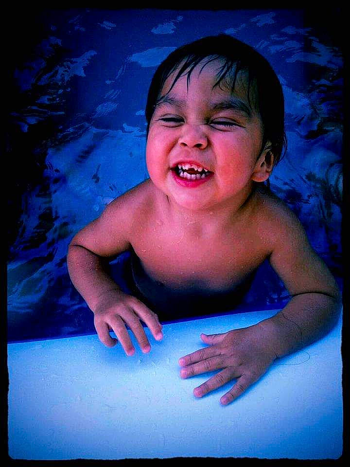 Izac is registered to the contest to win money with this photo: art, bathing, cheek, chest, child, chin, electric_blue, eyelash, face, flash_photography, fun, gesture, happy, human_body, jaw, mouth, nose, people_in_nature, person, smile