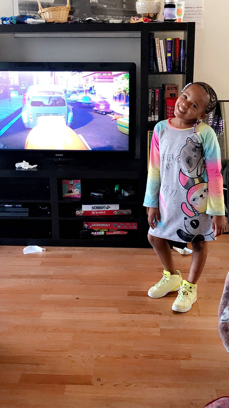 Ka'Layah joined the competition — help win amazing prizes! audio_equipment, display_device, electronic_device, entertainment, flat_panel_display, floor, flooring, gadget, happy, hardwood, home_appliance, joy, leisure, output_device, person, shorts, smile, sportswear, television, television_set