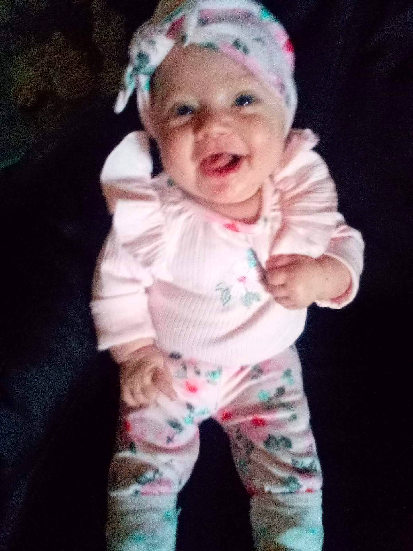 Julianna joined the competition — help win amazing prizes! baby, baby_toddler_clothing, cap, cheek, child, eye, face, happy, head, headwear, human_body, lip, magenta, nose, pattern, person, pink, skin, sleeve, smile