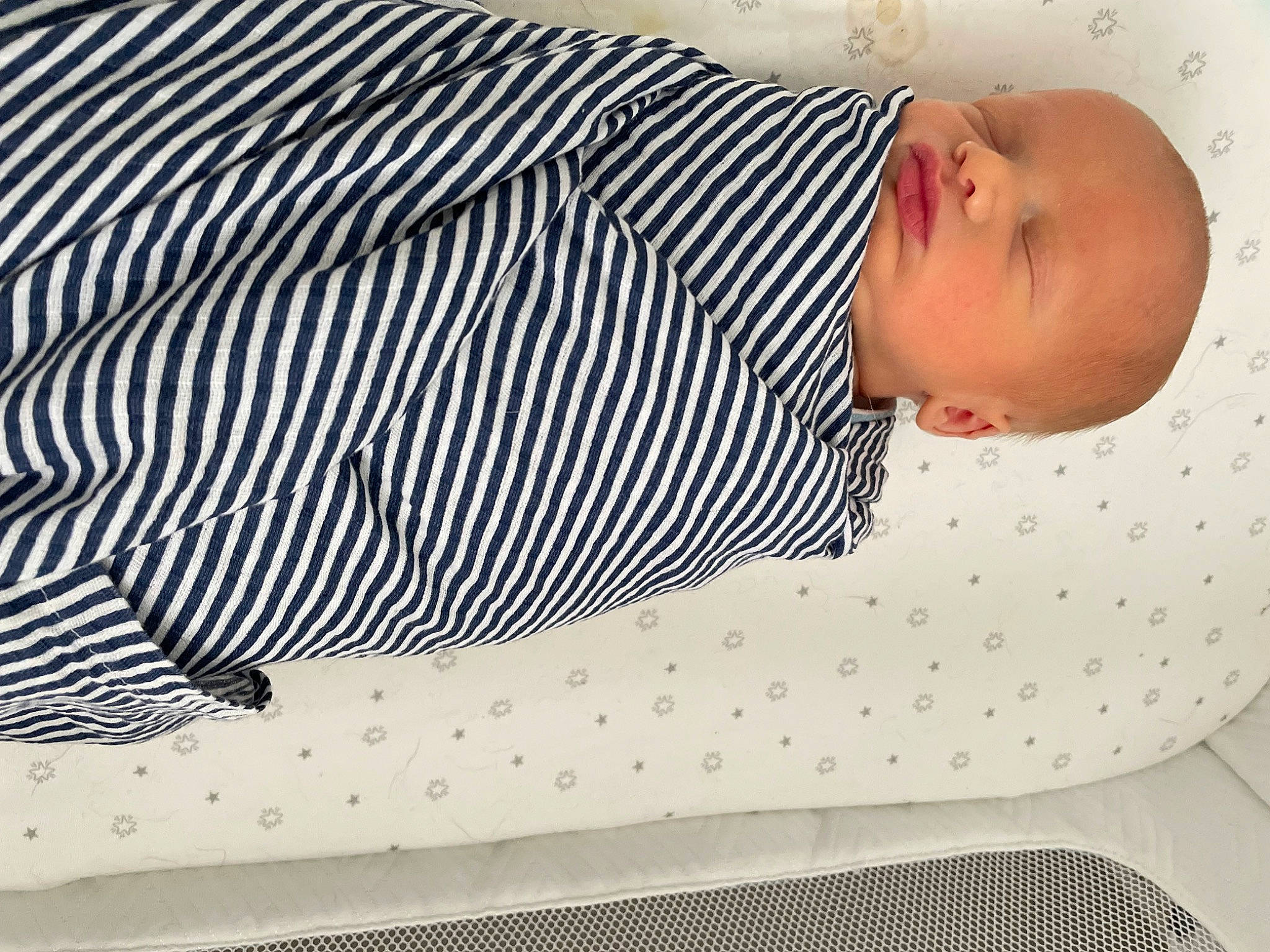 Jaxton joined the competition — help win amazing prizes! arm, baby, baby_products, baby_safety, baby_sleeping, baby_toddler_clothing, child, circle, comfort, electric_blue, human_leg, linens, nap, pattern, person, sleep, sleeve, textile, thigh, toddler