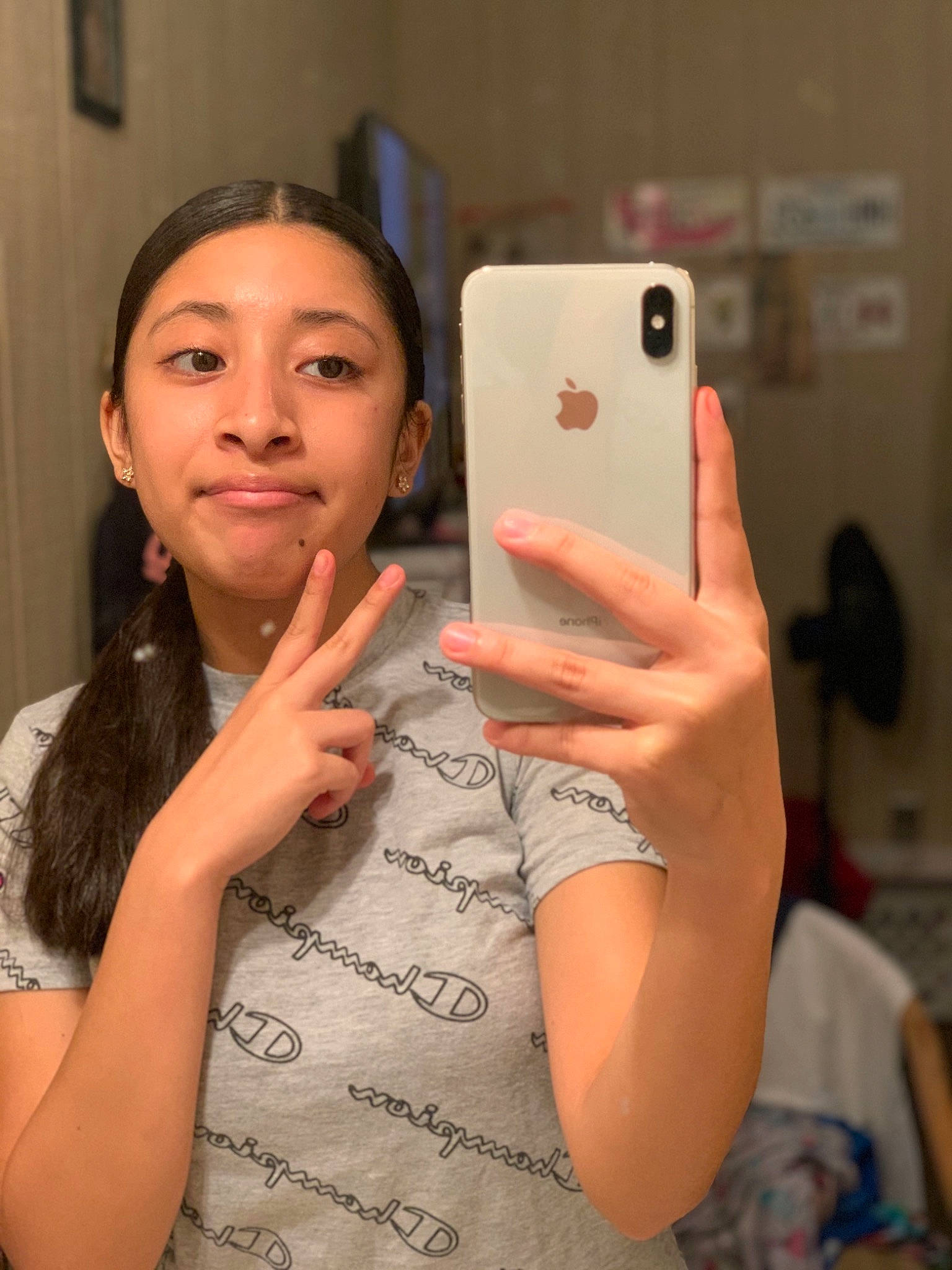 Dennise is registered to the contest to win money with this photo: child, communication_device, electronic_device, finger, gadget, gesture, hand, lip, mobile_phone, person, photography, selfie, skin, smile, technology, thumb