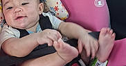 Nevaeh joined the competition — help win amazing prizes! baby, butterfly_pattern, car_seat, child, face, family, feet, floral_pattern, hands, happy, infant, legs, outdoor_light, pink, portrait, safety_harness, sitting, smiling, travel, vehicle
