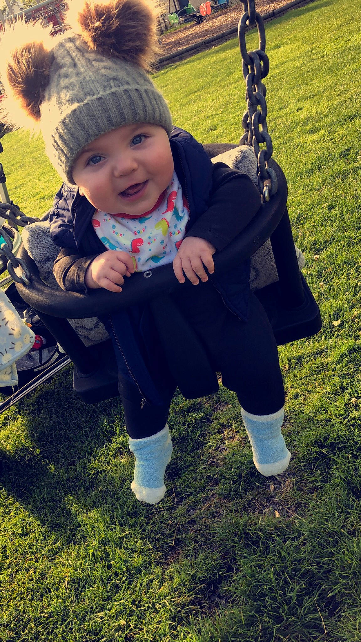 Callan joined the competition — help win amazing prizes! baby, cheek, child, cool, fun, grass, green, happy, lawn, outerwear, people, person, plant, play, sitting, skin, smile, swing, toddler, tree