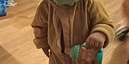 Odin is registered to the contest to win money with this photo: baby, bodypart, bonnet, boy, child, clothing, face, finger, footwear, hand, hardwood, hat, head, male, person, photography, plywood, portrait, shoe, wood