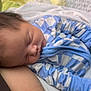 Avery is registered to the contest to win money with this photo: baby, sleeping, infant, onesie, blue, white, pacifier, blanket, arm, resting, cozy, closeup, child, soft, indoors, peaceful, cute, newborn, person, tender