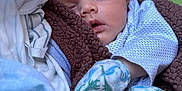 Avery is registered to the contest to win money with this photo: baby, newborn, sleeping, blanket, mittens, cozy, infant, cute, peaceful, soft, warm, child, clothing, portrait, resting, wrapped, indoors, closeup, face, sleep