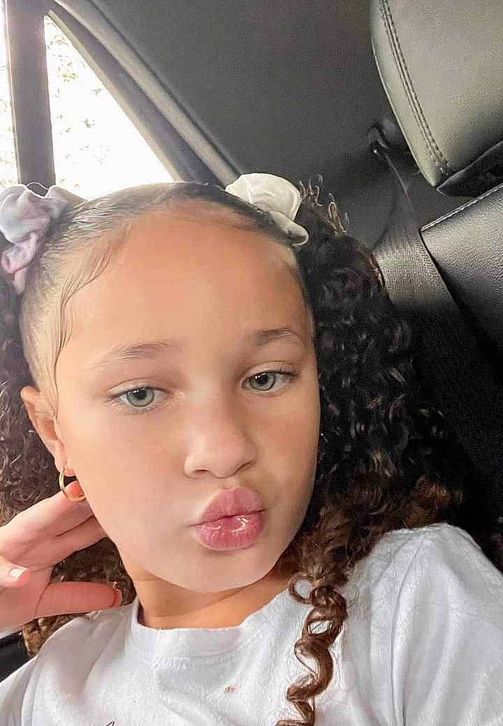 Aiyanna is registered to the contest to win money with this photo: black_hair, cheek, chin, cool, ear, eyebrow, eyelash, face, forehead, fun, happy, headgear, iris, jaw, lip, mouth, neck, nose, person, skin