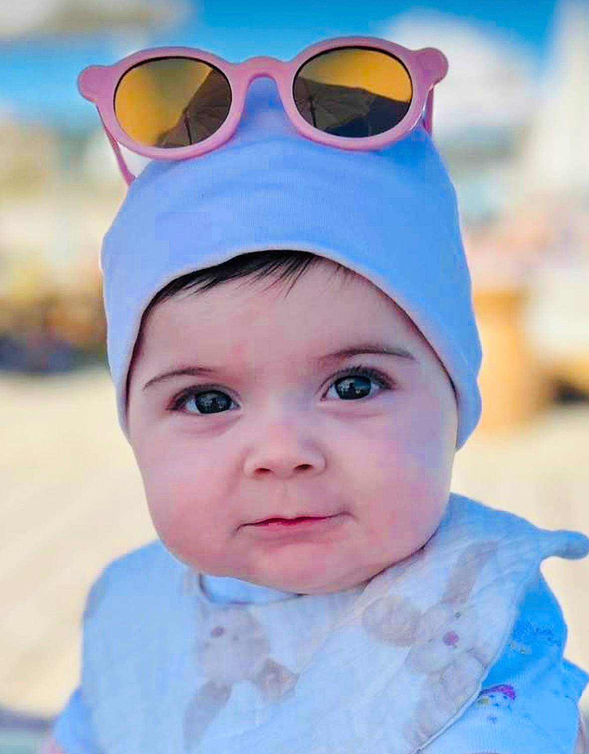 Eden participe au concours pour gagner de l'argent avec cette photo : azure, baby, baby_toddler_clothing, cap, chin, eyewear, fun, glasses, goggles, happy, head, headgear, headwear, outerwear, person, photograph, pink, sleeve, sunglasses, toddler