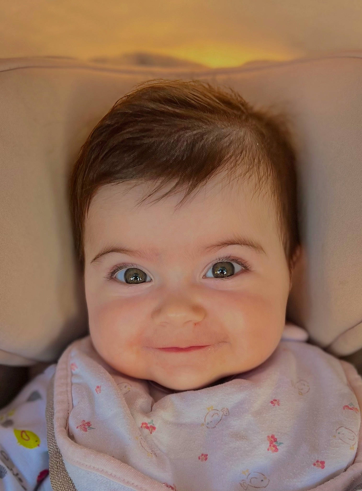 Eden participe au concours pour gagner de l'argent avec cette photo : baby, baby_toddler_clothing, bib, cheek, child, chin, collar, eye, eyebrow, eyelash, happy, iris, lip, no_expression, nose, person, sitting, skin, sleeve, smile