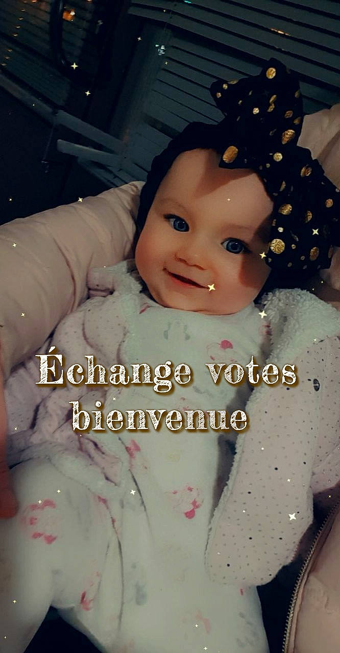 Mélynda participe au concours pour gagner de l'argent avec cette photo : baby, cheek, child, chin, doll, event, eyebrow, eyelash, face, fashion_accessory, flash_photography, formal_wear, happy, headpiece, lip, ornament, person, smile, textile, toddler