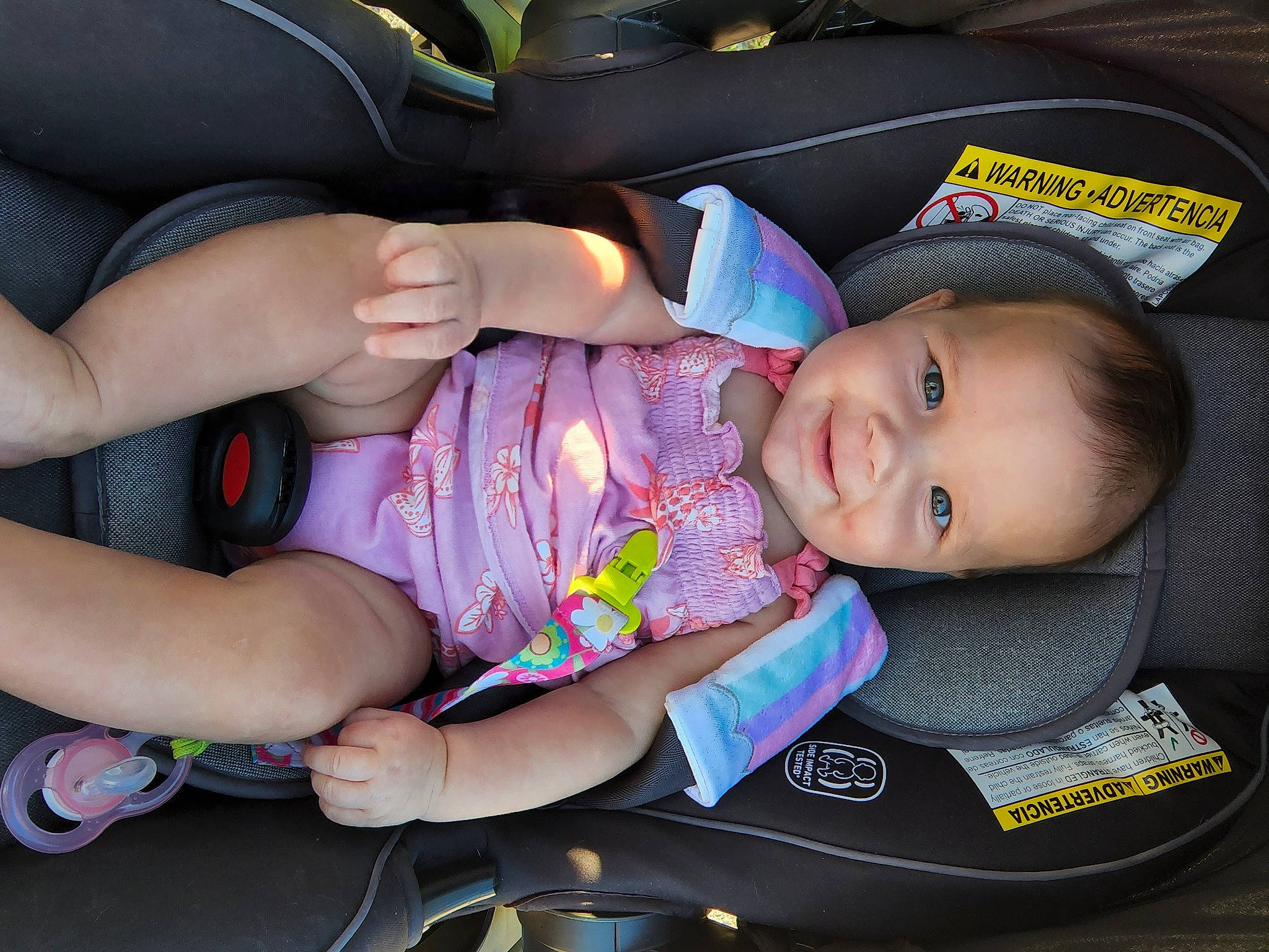 Kynslee is registered to the contest to win money with this photo: auto_part, baby, baby_carriage, baby_in_car_seat, baby_products, baby_toddler_clothing, car_seat, cheek, child, comfort, human_leg, joy, knee, lap, nail, person, sitting, smile, sock, thigh