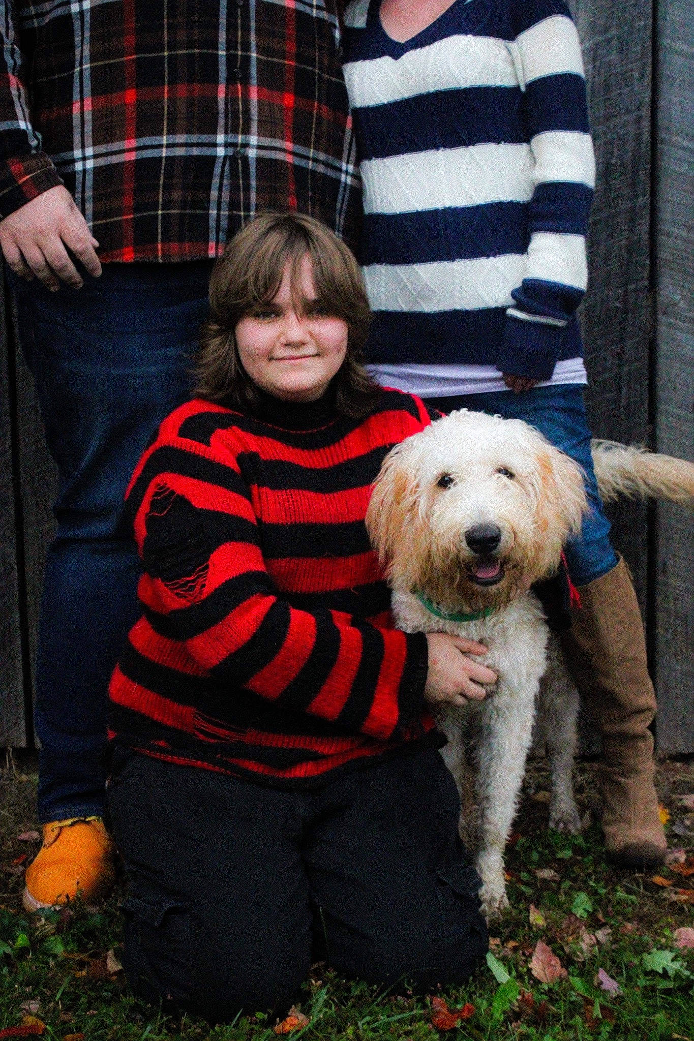 Bruno joined the competition — help win amazing prizes! canidae, carnivore, companion_dog, couch, dog, dog_breed, event, fun, fur, grass, leash, pattern, plaid, sitting, small_terrier, smile, sporting_group, t_shirt, tartan, terrier