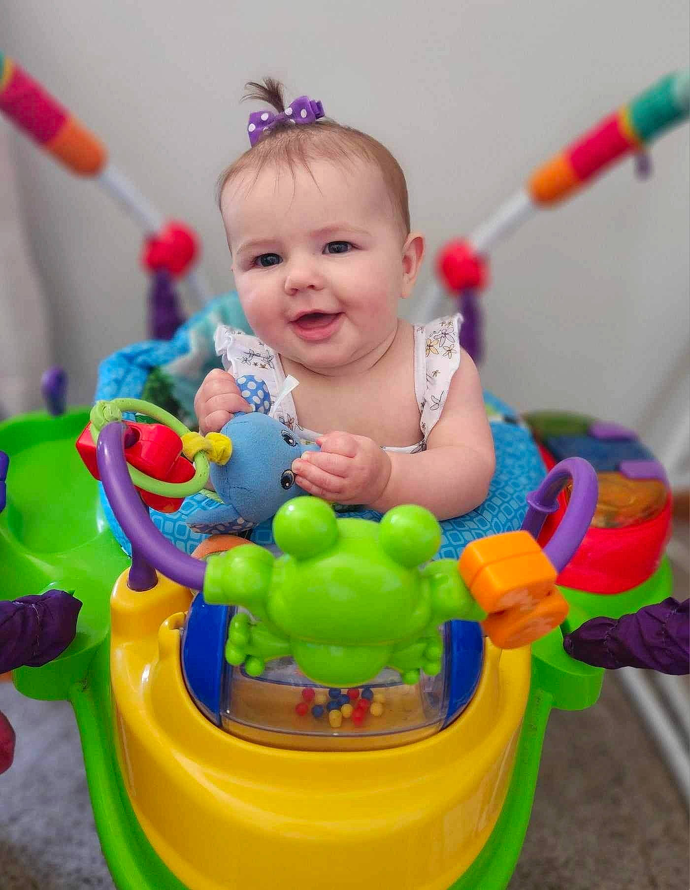 Collins is registered to the contest to win money with this photo: baby, baby_mobile, baby_playing_with_toys, baby_products, baby_toddler_clothing, baby_toys, child, event, fun, grass, happy, jewellery, joy, person, plastic, play, product, recreation, smile, sweetness